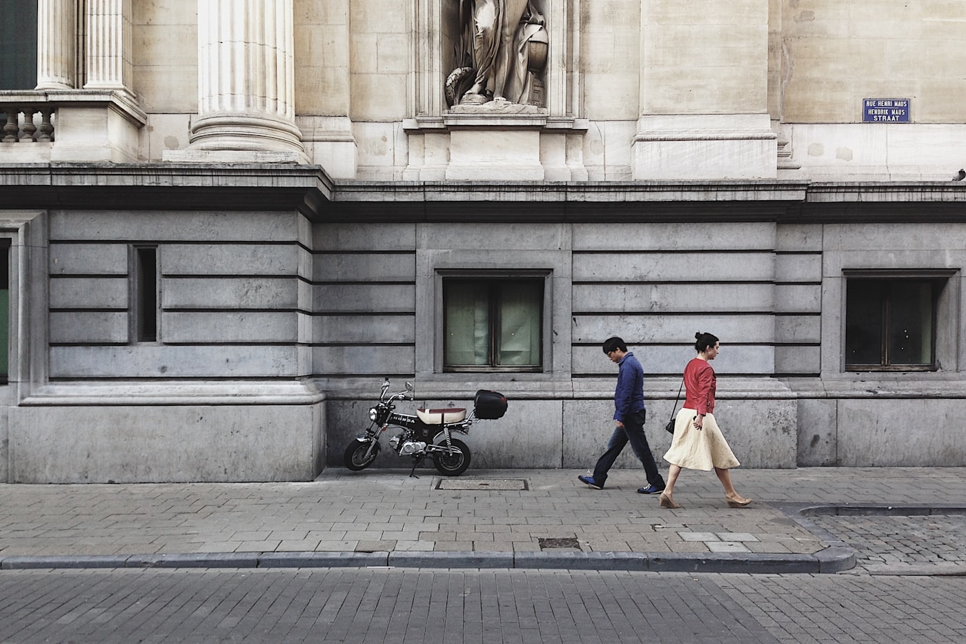 A passer-by in a red top